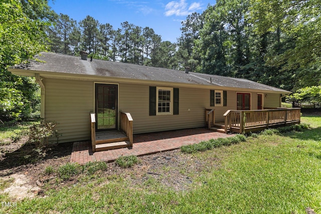 18 Red Pine Rd, Chapel Hill, NC 27516 - back of house featuring a yard and a wooden deck