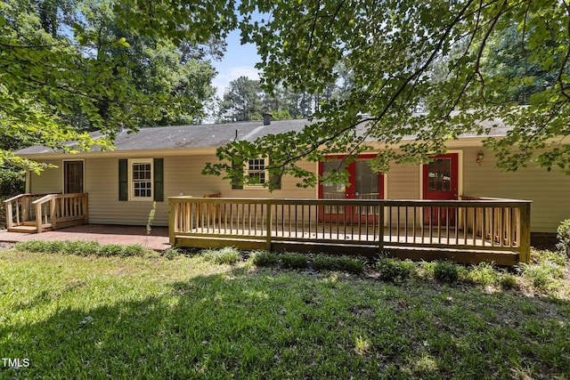 18 Red Pine Rd, Chapel Hill, NC 27516 - back of house with a lawn and a deck
