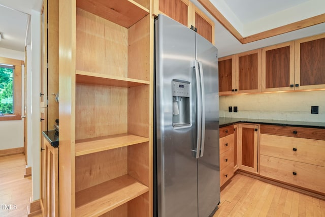 1209 Ravens Point Cir, Raleigh, NC 27614 - kitchen with stainless steel fridge, light wood-style floors, and dark countertops