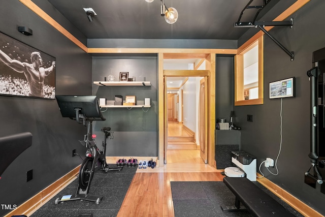 1209 Ravens Point Cir, Raleigh, NC 27614 - exercise room with wood finished floors and baseboards