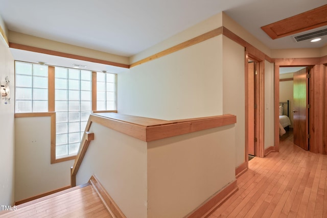 1209 Ravens Point Cir, Raleigh, NC 27614 - hallway featuring light wood-style floors and an upstairs landing