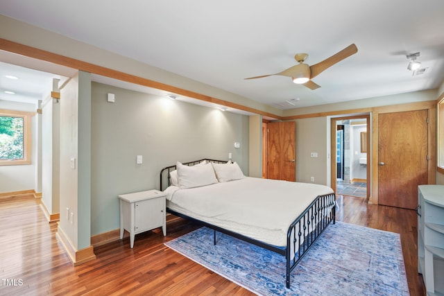 1209 Ravens Point Cir, Raleigh, NC 27614 - bedroom with wood finished floors and ceiling fan