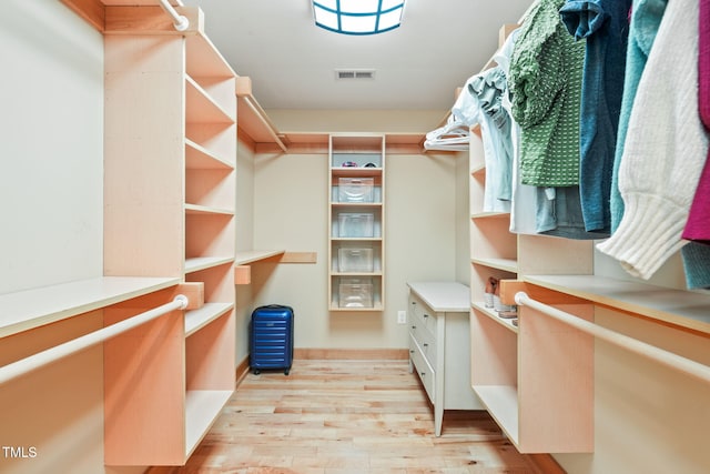 1209 Ravens Point Cir, Raleigh, NC 27614 - spacious closet with light wood-style flooring