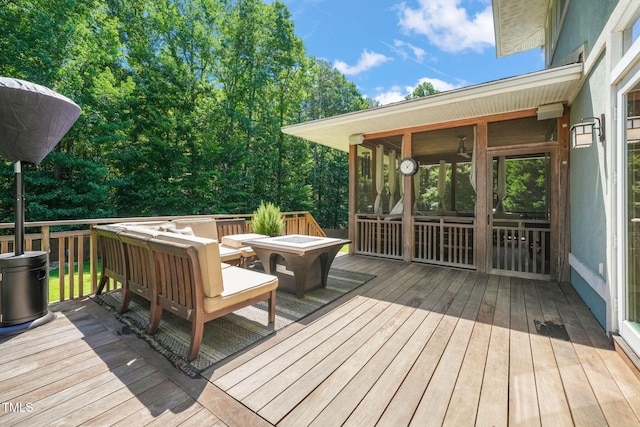1209 Ravens Point Cir, Raleigh, NC 27614 - wooden terrace featuring a sunroom and an outdoor living space with a fire pit