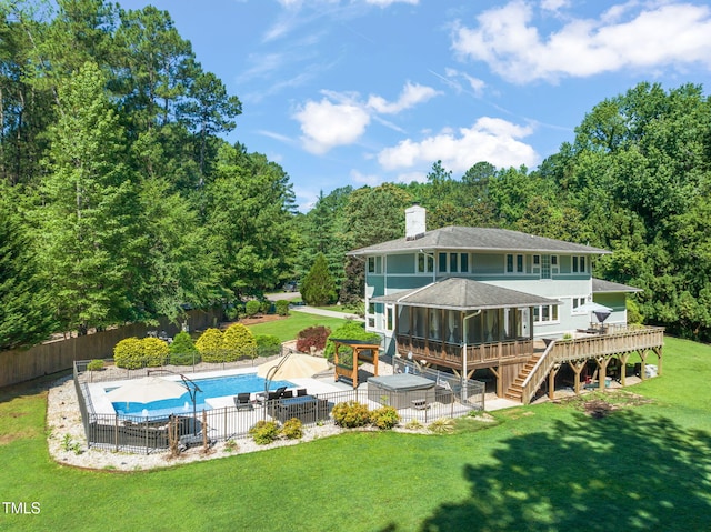 1209 Ravens Point Cir, Raleigh, NC 27614 - rear view of property with a wooden deck, a fenced backyard, a sunroom, a chimney, and stairway