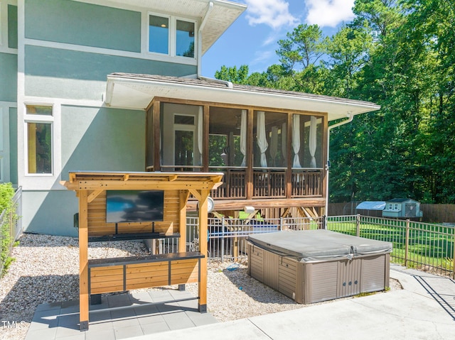 1209 Ravens Point Cir, Raleigh, NC 27614 - view of patio featuring a hot tub, a sunroom, and a storage shed
