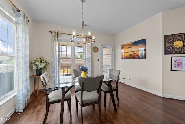 16 Woodglen Dr, Clayton, NC 27527 - dining room featuring a chandelier and dark wood-style floors
