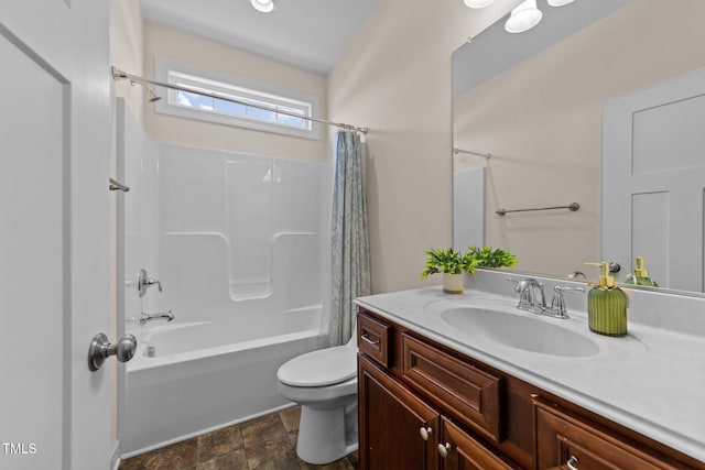 16 Woodglen Dr, Clayton, NC 27527 - full bathroom featuring shower / tub combo with curtain, vanity, and stone finish flooring
