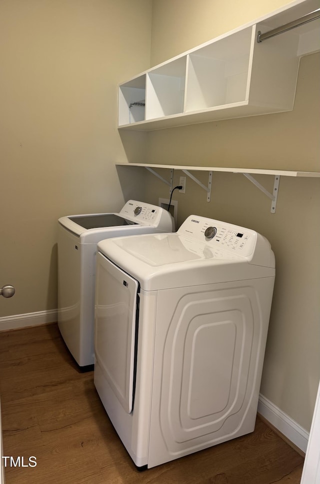 3005 Condor Ct, Deep Run, NC 28525 - laundry area featuring washer and clothes dryer and light wood-type flooring