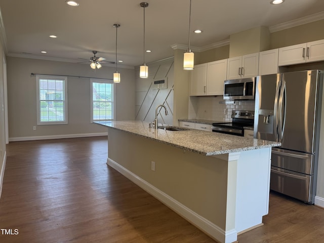 3005 Condor Ct, Deep Run, NC 28525 - kitchen with stainless steel appliances, ceiling fan, recessed lighting, white cabinetry, and backsplash