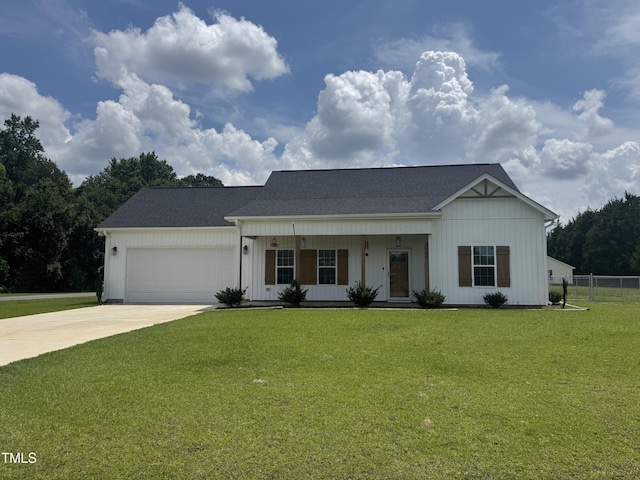 3005 Condor Ct, Deep Run, NC 28525 - modern farmhouse with driveway, an attached garage, a porch, board and batten siding, and a shingled roof