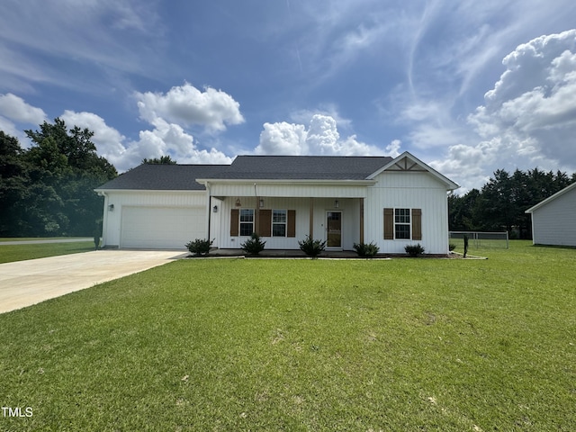 3005 Condor Ct, Deep Run, NC 28525 - modern inspired farmhouse featuring concrete driveway, covered porch, a garage, board and batten siding, and roof with shingles