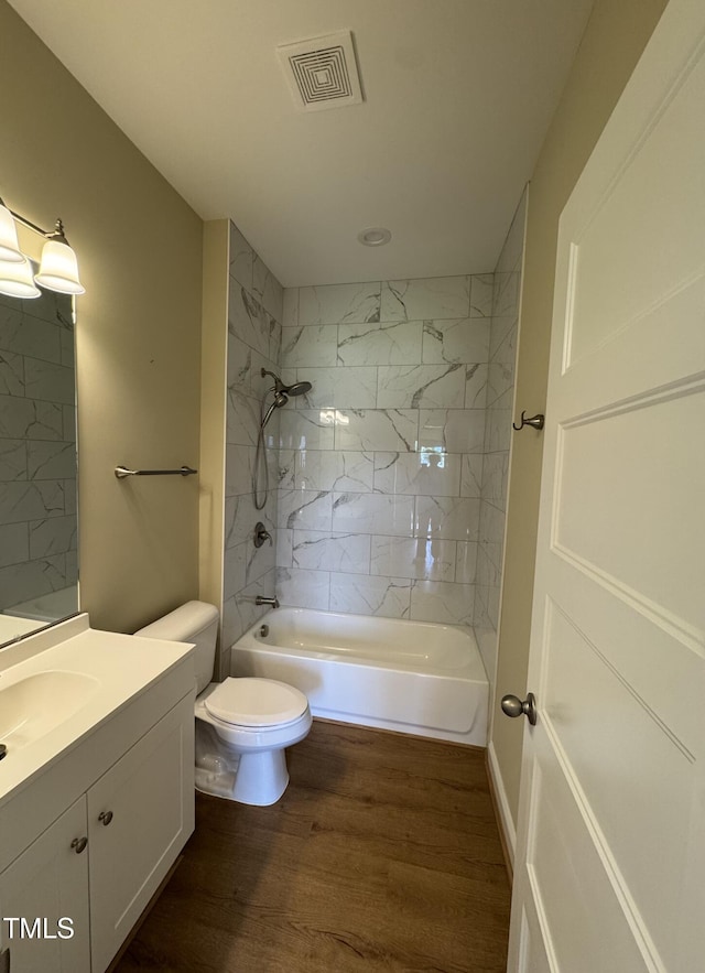 3005 Condor Ct, Deep Run, NC 28525 - bathroom featuring vanity, wood finished floors, and bathing tub / shower combination