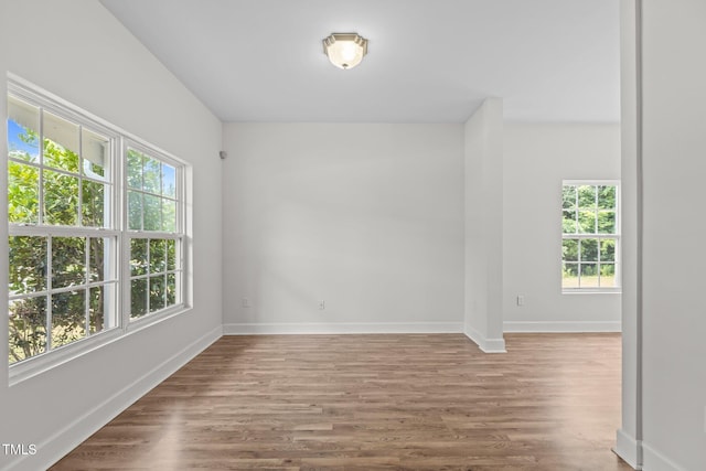 4716 Miller Dr, Durham, NC 27704 - empty room with wood finished floors and baseboards