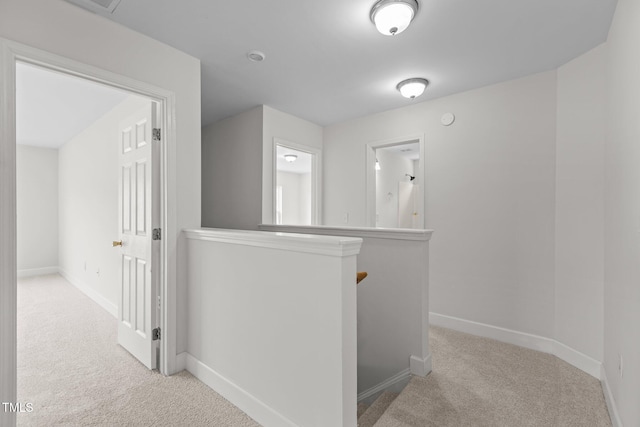 4716 Miller Dr, Durham, NC 27704 - hall featuring carpet flooring and an upstairs landing