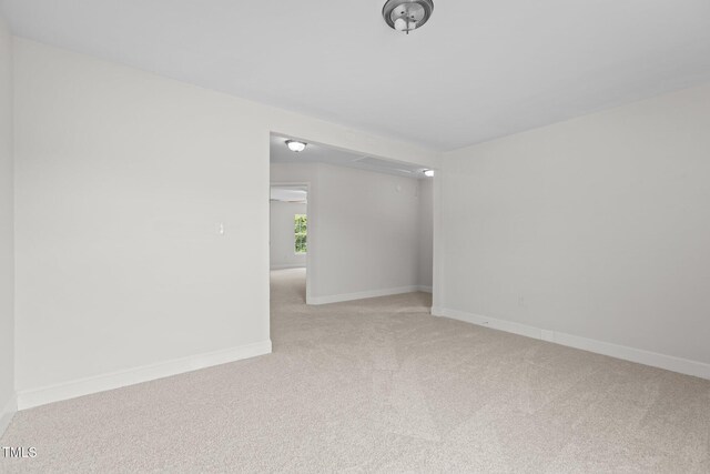 4716 Miller Dr, Durham, NC 27704 - unfurnished room featuring light carpet and baseboards