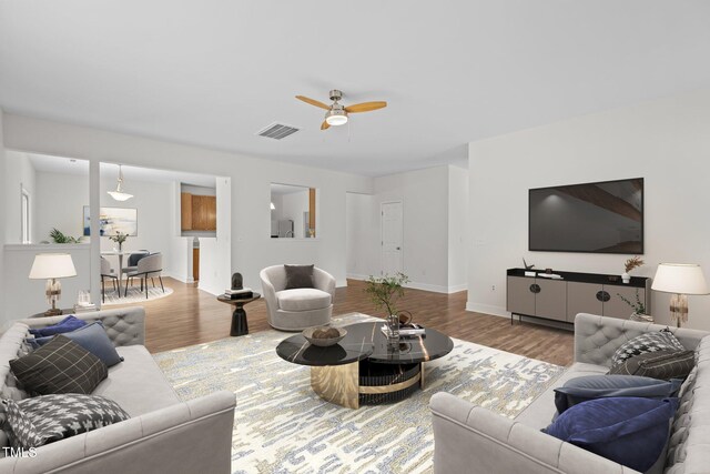 4716 Miller Dr, Durham, NC 27704 - living area featuring ceiling fan and wood finished floors