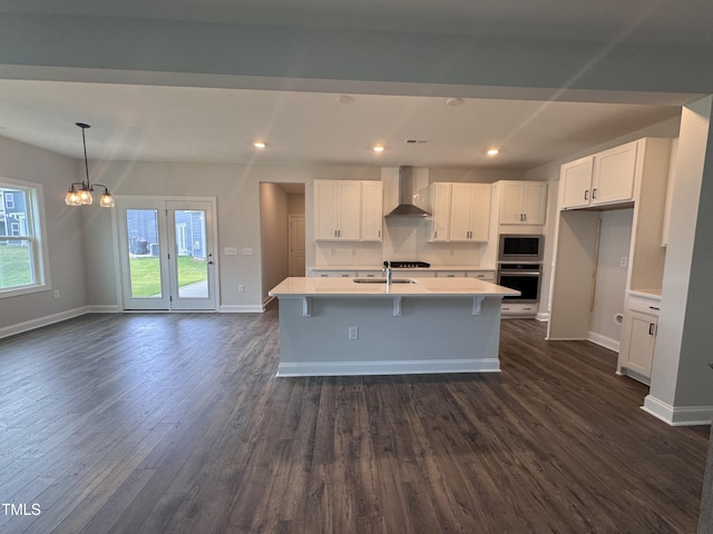 3509 Bailey Lake Dr, Fuquay Varina, NC 27526 - kitchen with stainless steel appliances, wall chimney range hood, white cabinetry, dark wood-type flooring, and recessed lighting