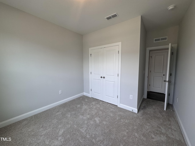 3509 Bailey Lake Dr, Fuquay Varina, NC 27526 - unfurnished bedroom featuring carpet flooring and a closet