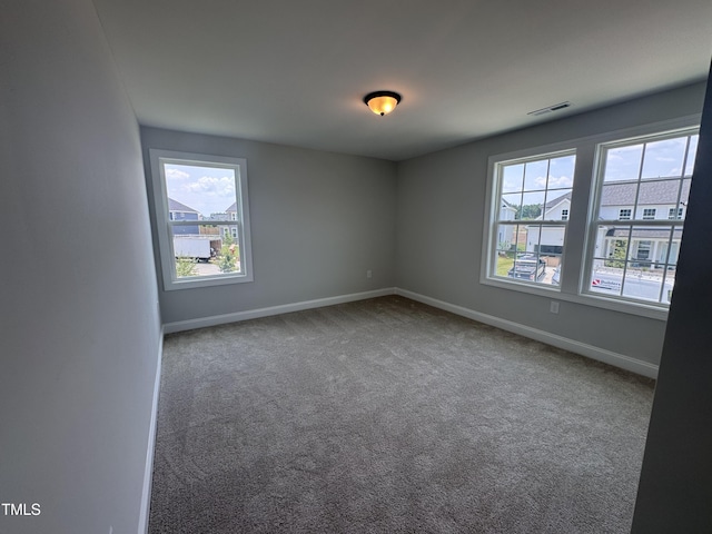 3509 Bailey Lake Dr, Fuquay Varina, NC 27526 - empty room with plenty of natural light and carpet flooring