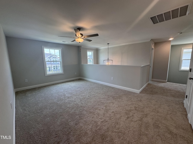3509 Bailey Lake Dr, Fuquay Varina, NC 27526 - carpeted empty room with plenty of natural light and ceiling fan