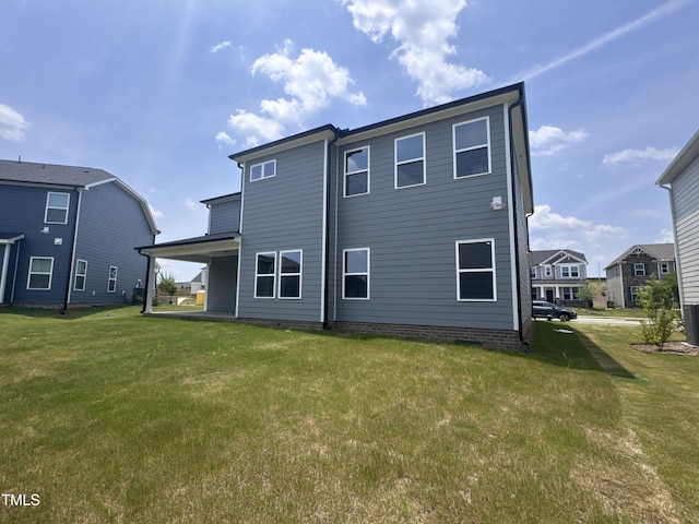 3509 Bailey Lake Dr, Fuquay Varina, NC 27526 - rear view of house with a yard