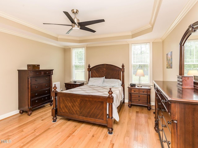 30 Cole Creek Way, Franklinton, NC 27525 - bedroom with light wood-type flooring, multiple windows, ornamental molding, and a ceiling fan