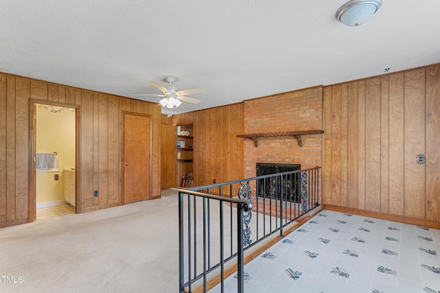 1315 Elder Way, Burlington, NC 27215 - corridor featuring wooden walls and an upstairs landing