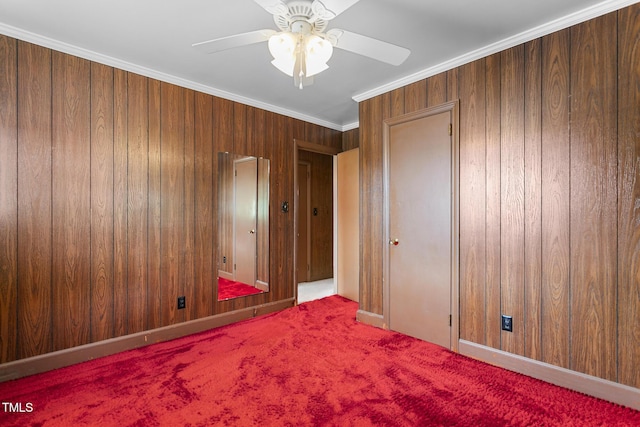 1315 Elder Way, Burlington, NC 27215 - unfurnished bedroom featuring carpet, crown molding, a ceiling fan, and wooden walls
