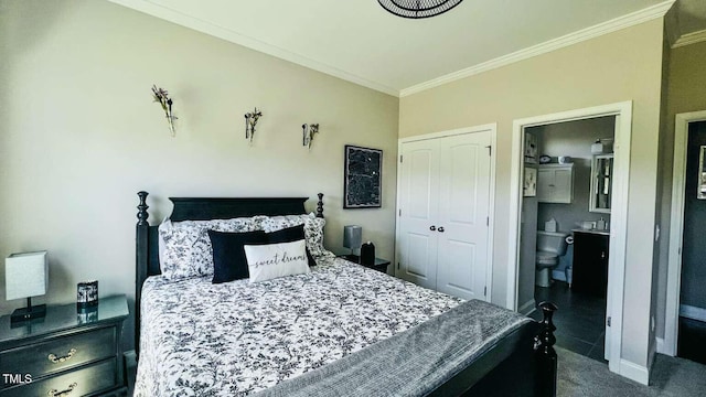 192 Waterpine Dr, Garner, NC 27529 - bedroom with ornamental molding, a closet, ensuite bathroom, and dark colored carpet