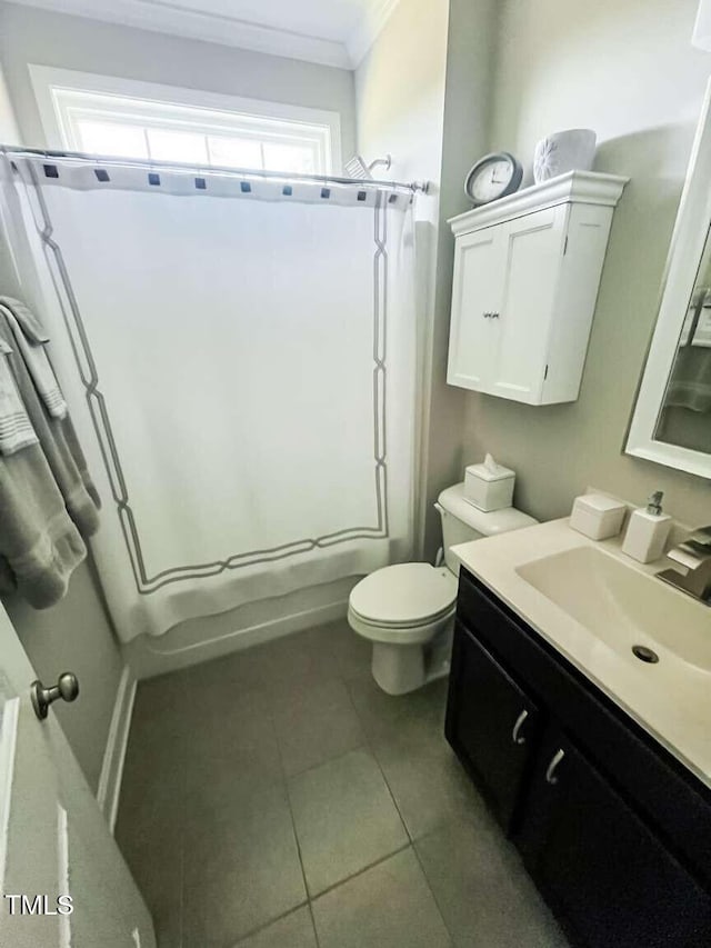 192 Waterpine Dr, Garner, NC 27529 - full bathroom with crown molding, vanity, tile patterned floors, and shower / tub combo