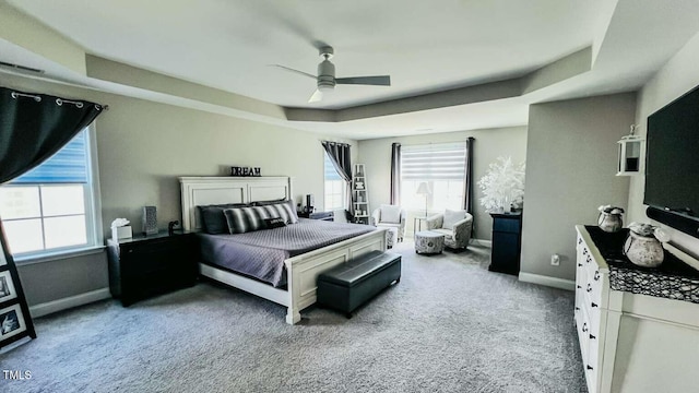 192 Waterpine Dr, Garner, NC 27529 - carpeted bedroom with a raised ceiling and ceiling fan