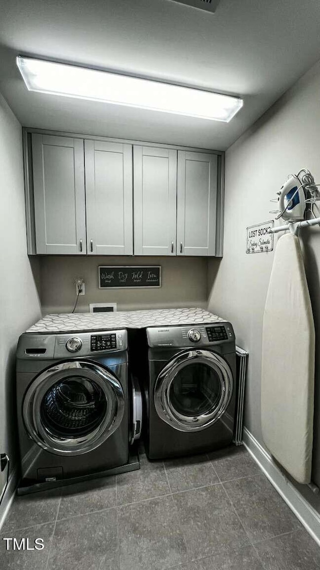 192 Waterpine Dr, Garner, NC 27529 - washroom with cabinet space and washer and dryer