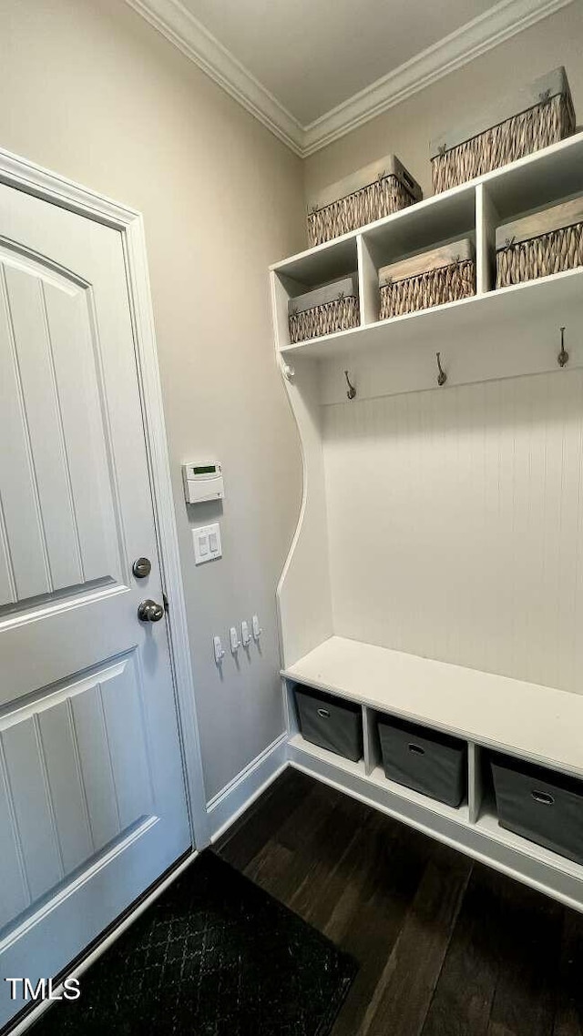 192 Waterpine Dr, Garner, NC 27529 - mudroom with dark wood finished floors and ornamental molding