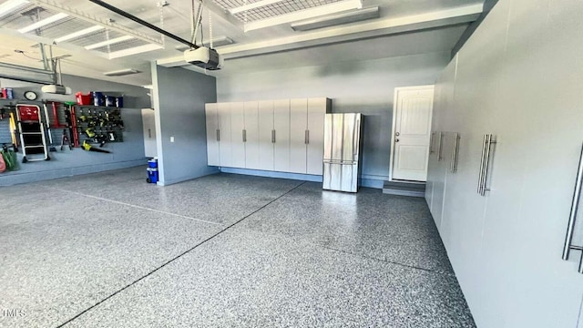 192 Waterpine Dr, Garner, NC 27529 - garage featuring a garage door opener