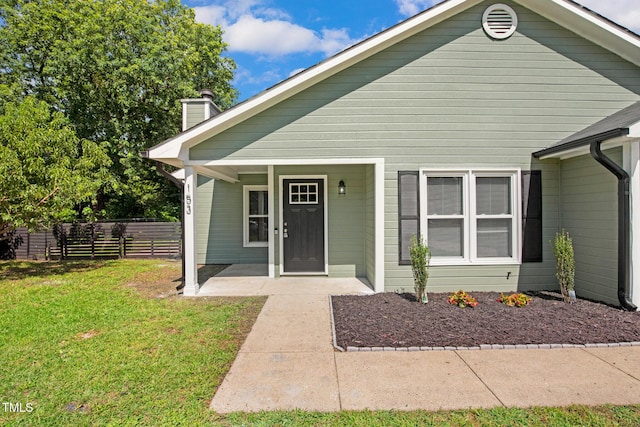 153 Eulon Loop, Raeford, NC 28376 - view of front facade featuring a chimney