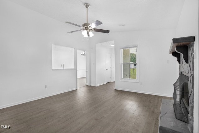 153 Eulon Loop, Raeford, NC 28376 - unfurnished living room with vaulted ceiling, dark wood-type flooring, and ceiling fan