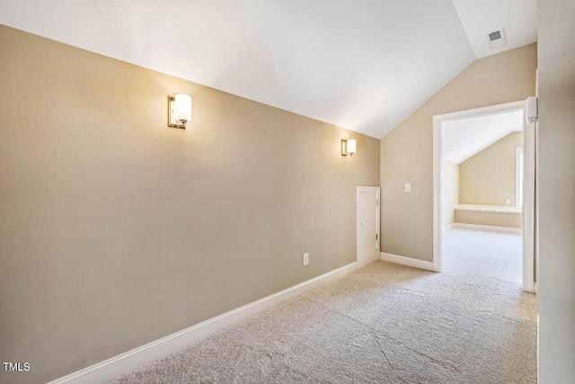 610 Bennett Mtn, Chapel Hill, NC 27516 - carpeted spare room featuring vaulted ceiling and baseboards