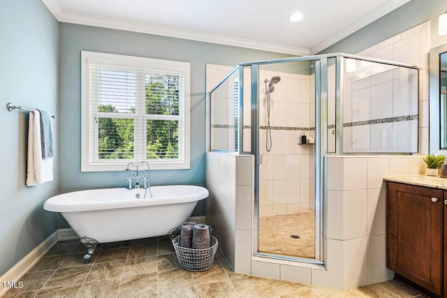 610 Bennett Mtn, Chapel Hill, NC 27516 - bathroom featuring a freestanding tub, a shower stall, vanity, ornamental molding, and recessed lighting