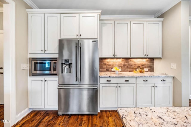 610 Bennett Mtn, Chapel Hill, NC 27516 - kitchen with stainless steel appliances, dark wood-style floors, backsplash, crown molding, and light stone countertops