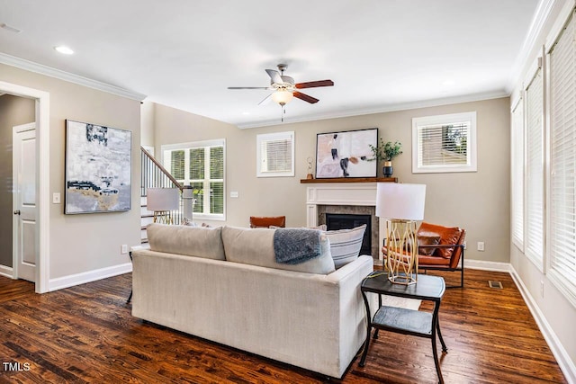 610 Bennett Mtn, Chapel Hill, NC 27516 - living room featuring a ceiling fan, a fireplace, crown molding, dark wood-style flooring, and stairs