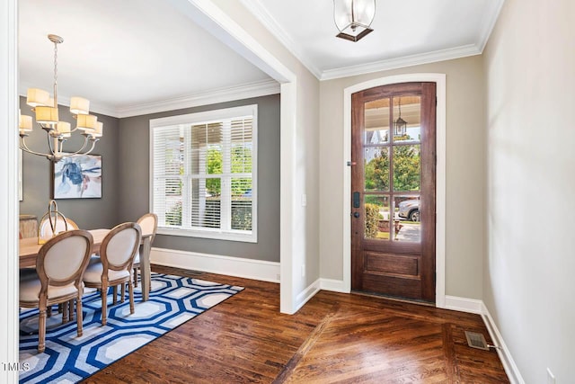 610 Bennett Mtn, Chapel Hill, NC 27516 - entrance foyer featuring a chandelier, wood finished floors, plenty of natural light, and ornamental molding
