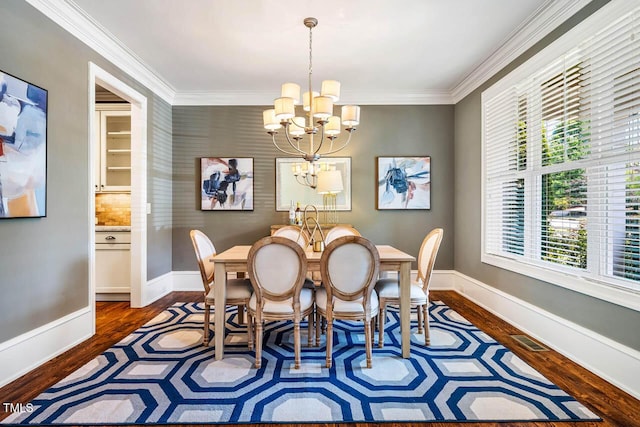 610 Bennett Mtn, Chapel Hill, NC 27516 - dining space featuring a chandelier, dark wood finished floors, and ornamental molding