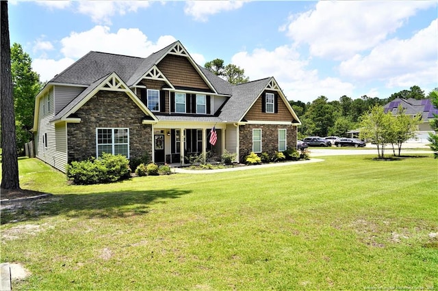 930 Old Vander Rd, Fayetteville, NC 28312 - view of front of house with stone siding and a front yard