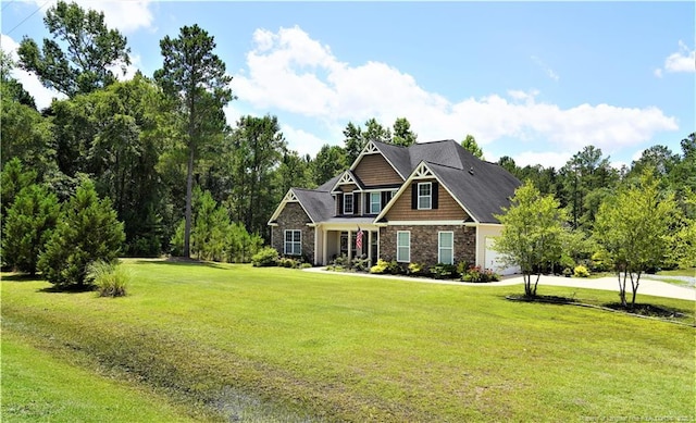 930 Old Vander Rd, Fayetteville, NC 28312 - craftsman house featuring stone siding, a front lawn, a garage, and driveway