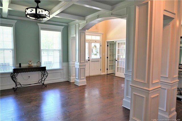 930 Old Vander Rd, Fayetteville, NC 28312 - foyer with dark wood finished floors, arched walkways, beam ceiling, coffered ceiling, and a decorative wall