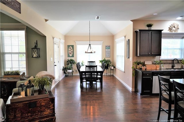 930 Old Vander Rd, Fayetteville, NC 28312 - dining space featuring vaulted ceiling, dark wood-type flooring, and a chandelier