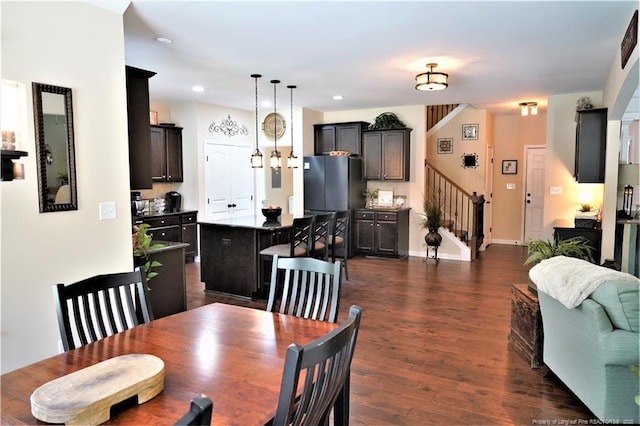 930 Old Vander Rd, Fayetteville, NC 28312 - dining room featuring stairway, dark wood-style flooring, and recessed lighting