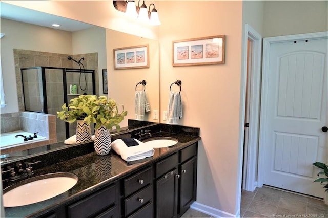 930 Old Vander Rd, Fayetteville, NC 28312 - full bathroom with a shower stall, double vanity, and a bath