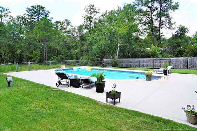 930 Old Vander Rd, Fayetteville, NC 28312 - view of pool featuring a patio, a fenced backyard, and view of scattered trees